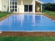 Pose de couverture de b&acirc;che de piscine